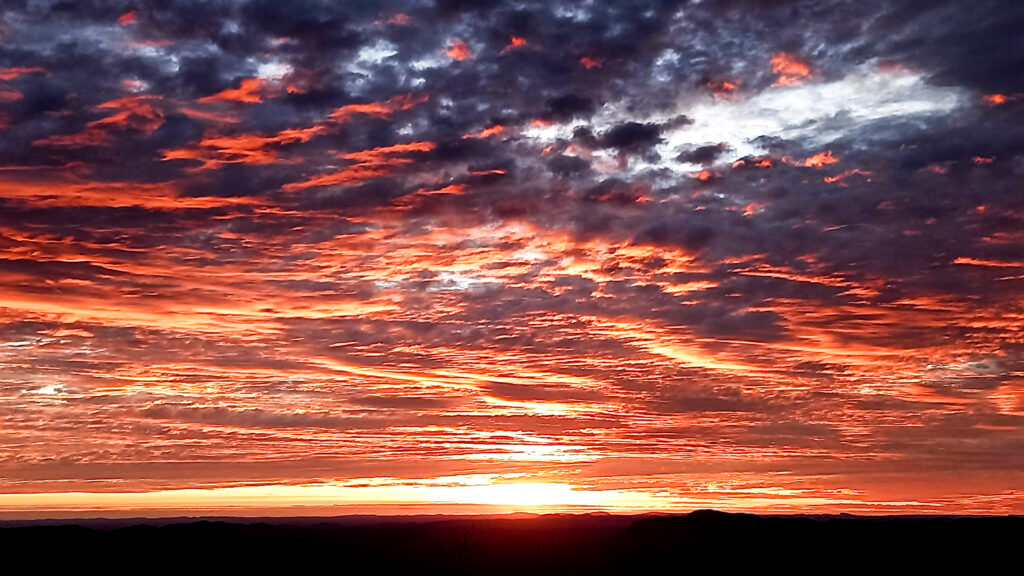Sunrise on top of Brinkley Bluff - Larapinta Trail