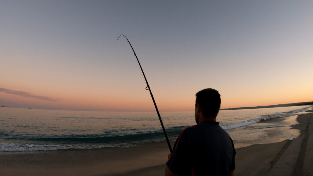 Fishing on the beach in Naracoopa 