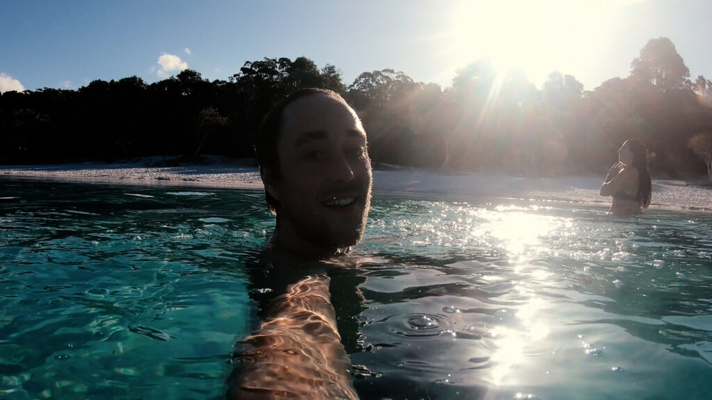Swimming in Lake McKenzie on Fraser Island, the world's largest sand island 
