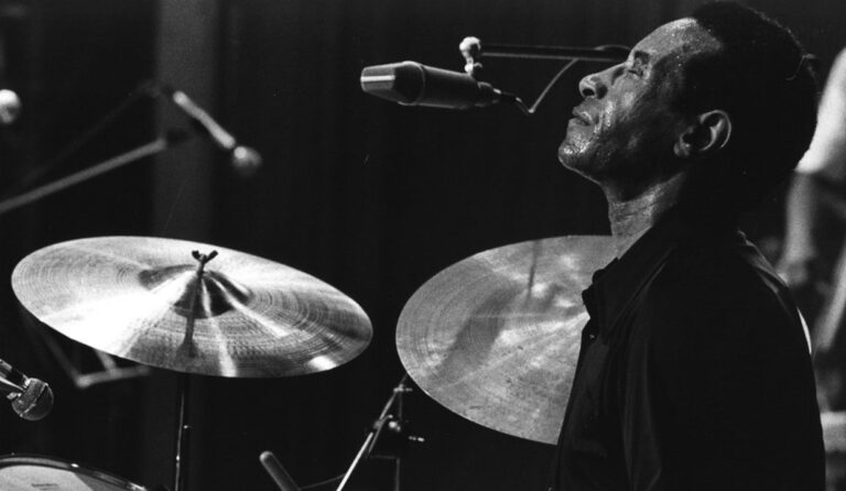 Max Roach playing the drum set